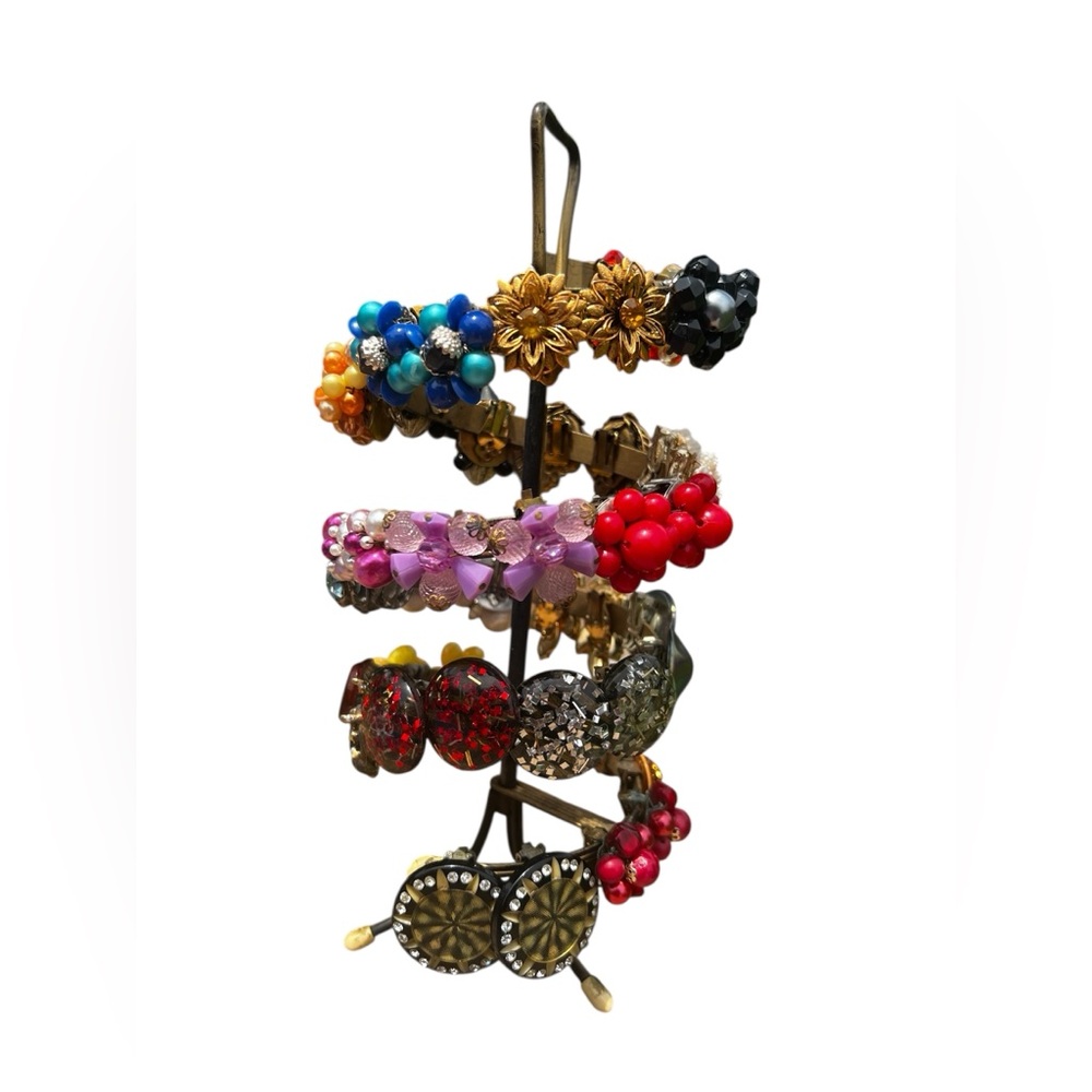 Beautiful vintage earring holder, with 23 pairs of antique earrings
